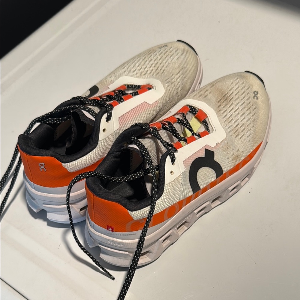 On Running Women’s Orange and White Sneakers